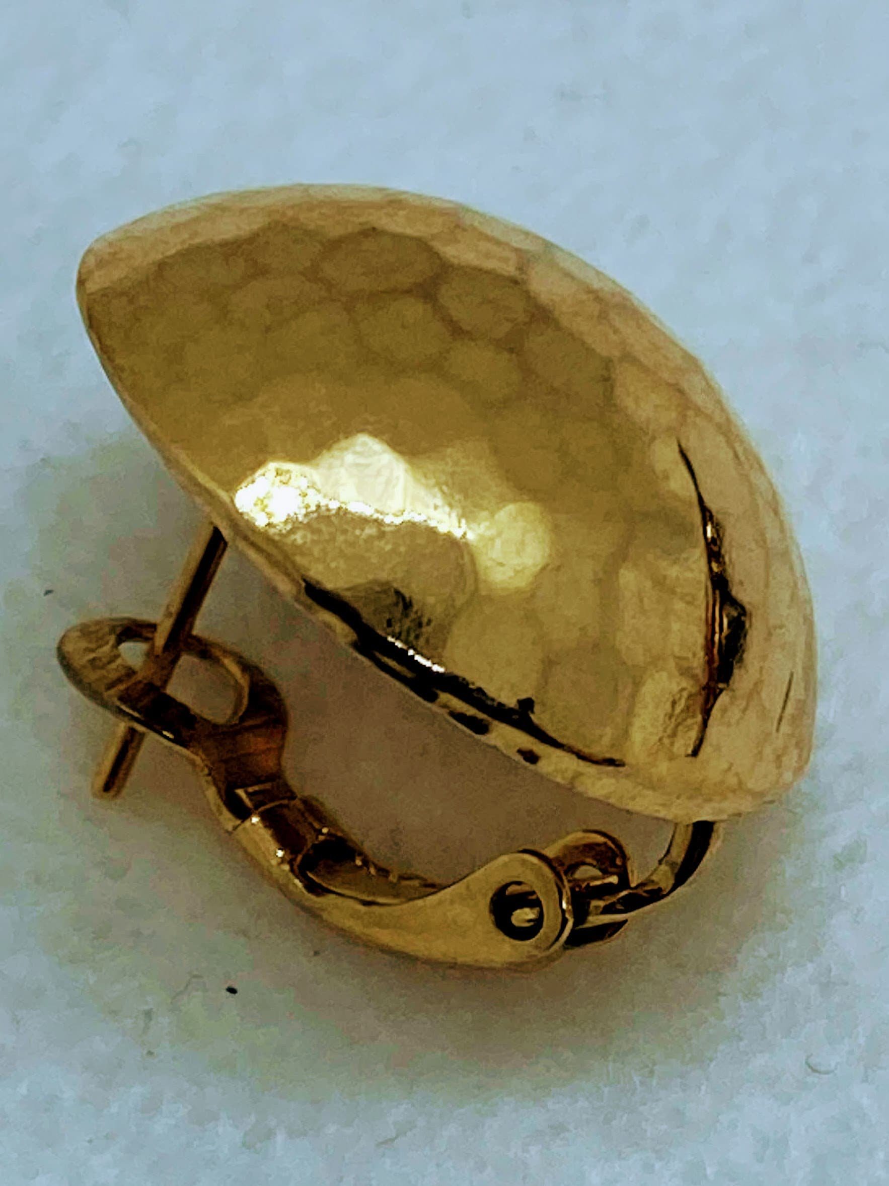 Rare Gold Tone Vintage Christian Dior Hammered Dome with Omega clips earrings.