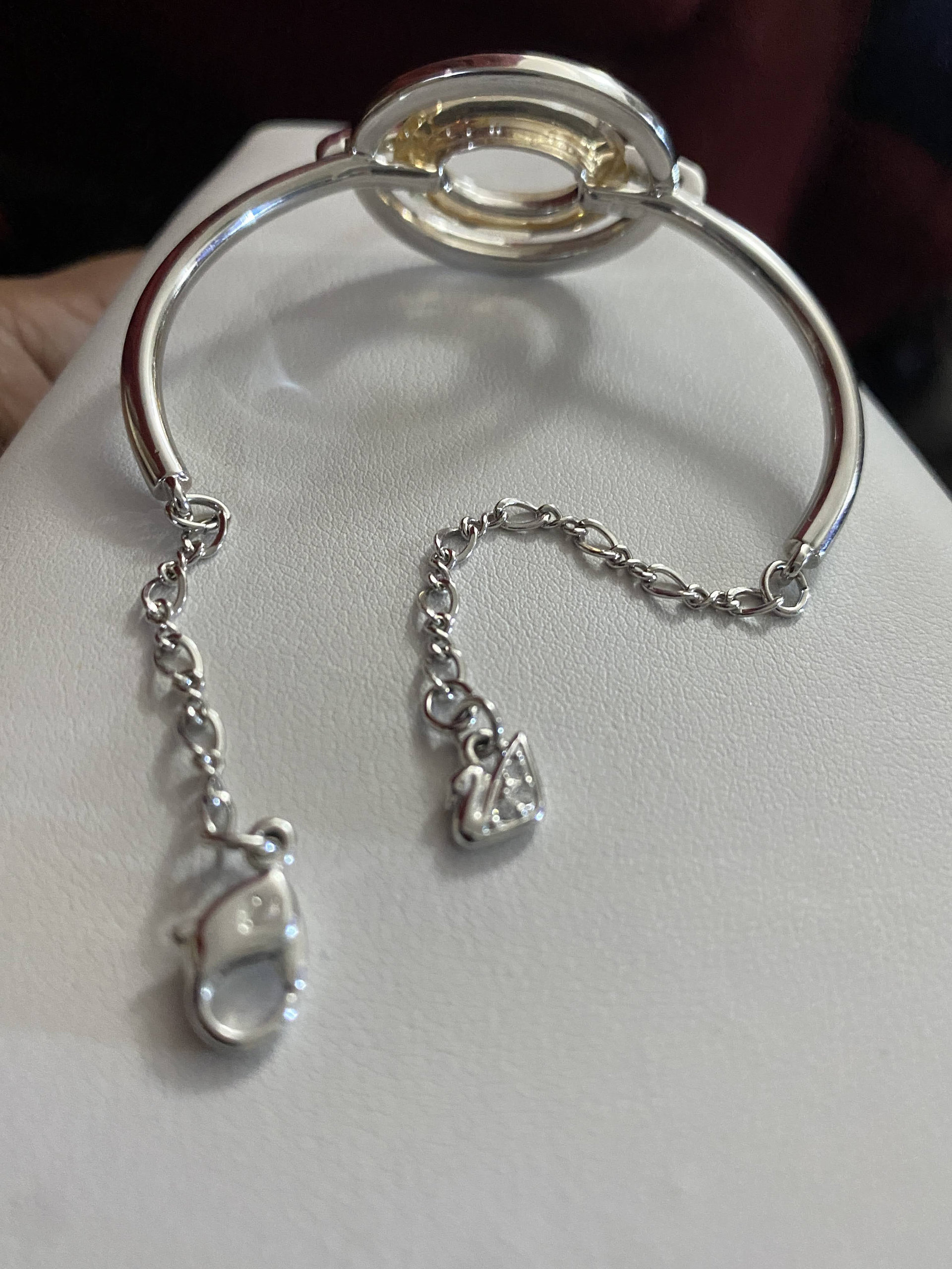 Authentic Swarovski Signed Logan Golden Shadow Bangle Bracelet and Rhodium-plated Circles Masquerade Pendant Pierced Earrings set.
