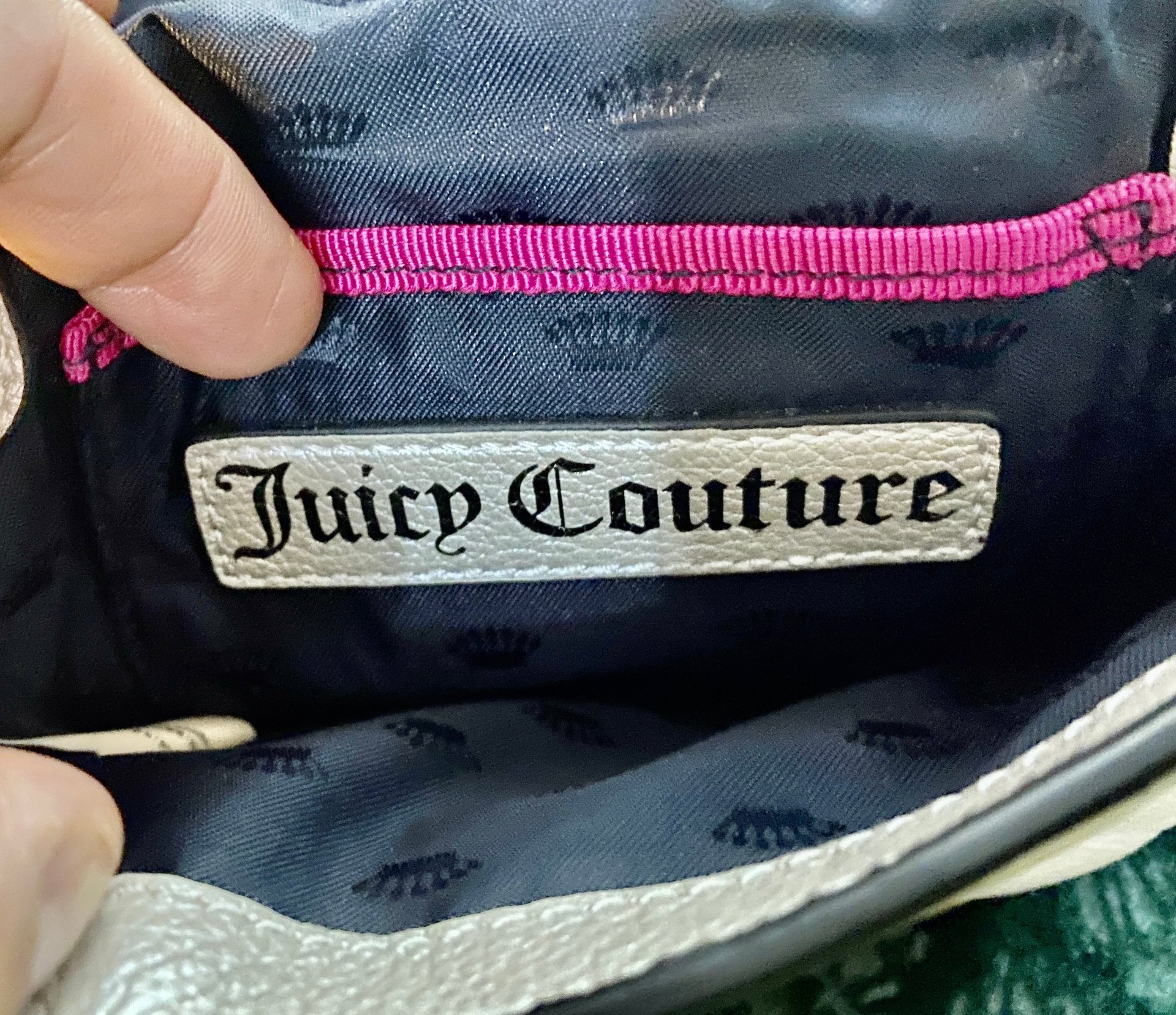 Bejeweled  Juicy Couture white with silver tone chain and dark stone