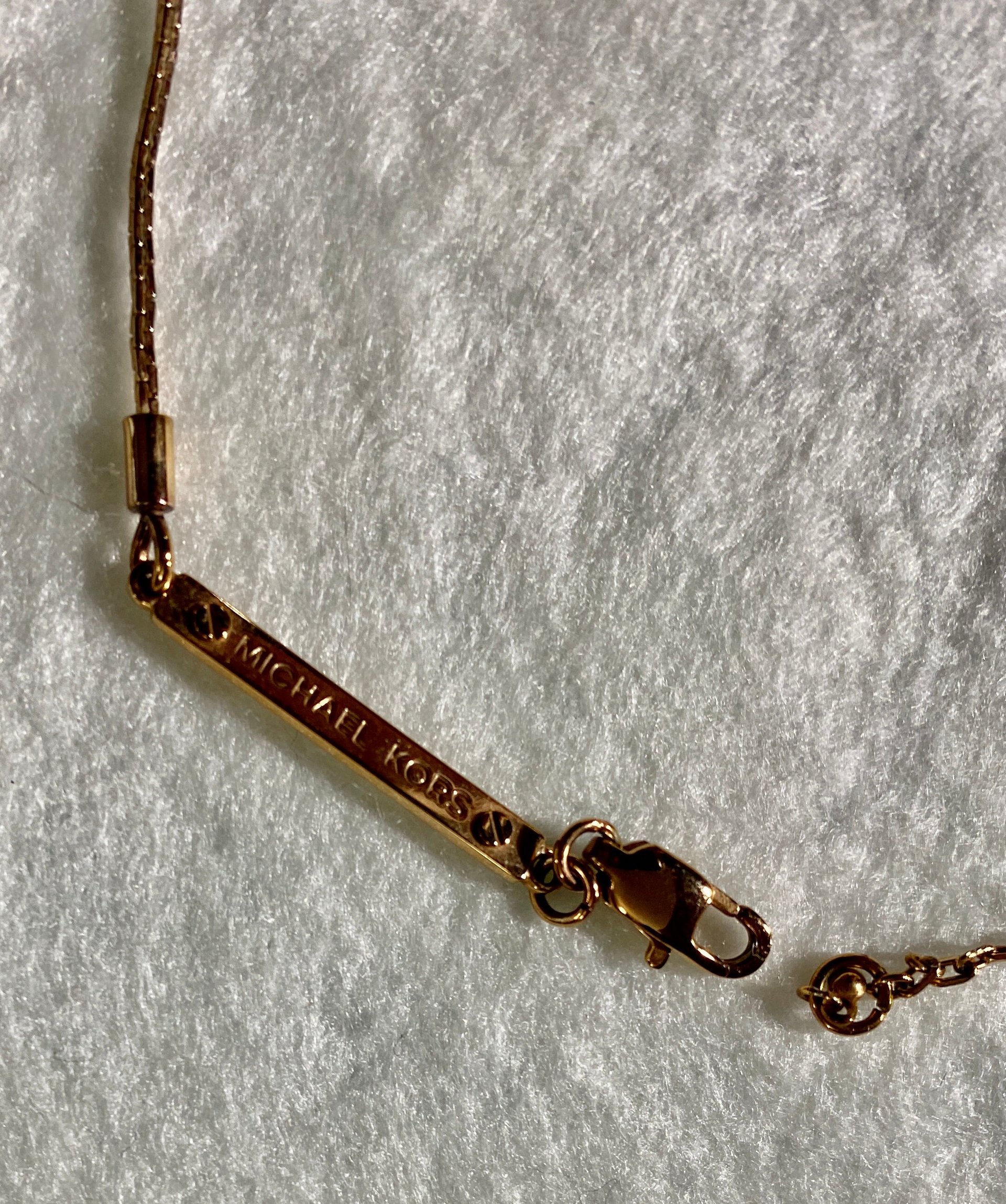 Long Curved Rose Gold Michael Kors Pendant