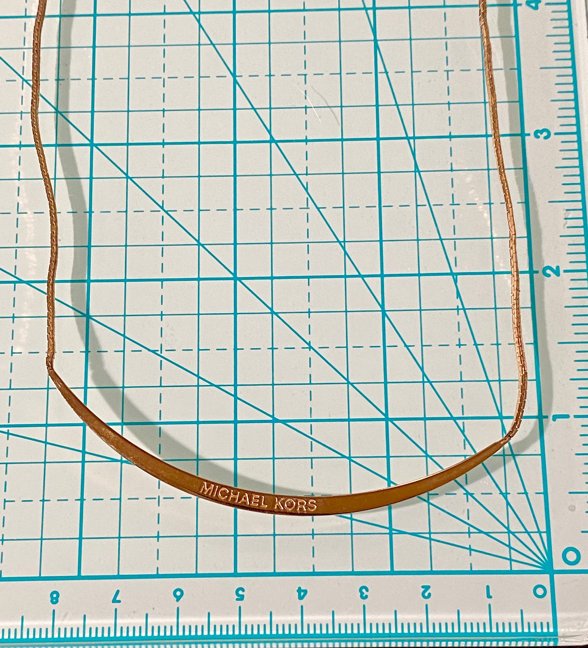 Long Curved Rose Gold Michael Kors Pendant