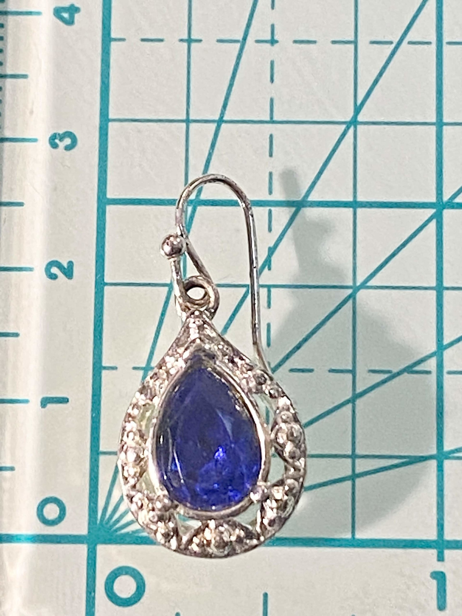 Vintage blue teardrop crystal halo NRT signed pendant on a silver chain with matching dangle earrings.