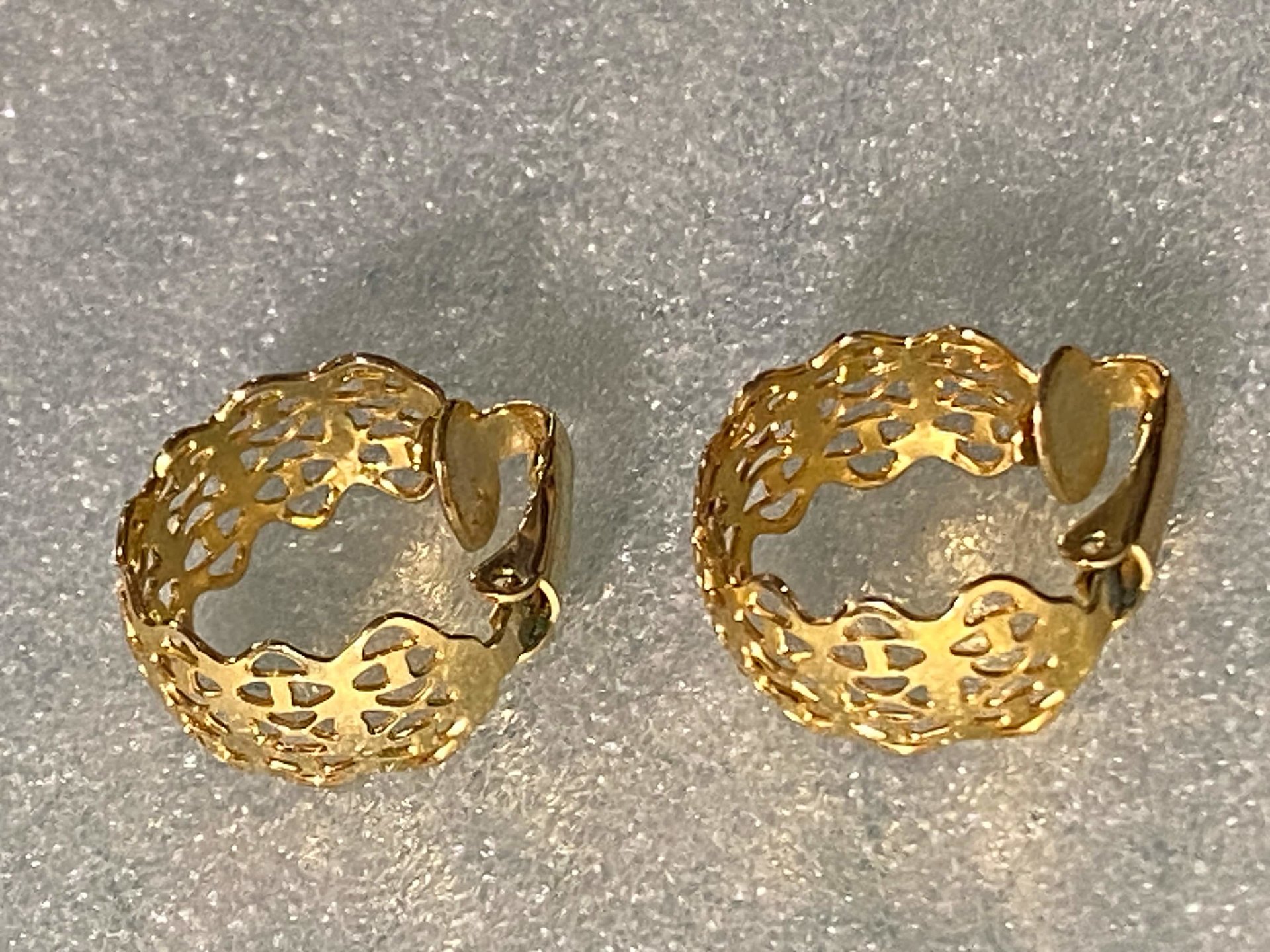 Gold tone thick Art Nouveau love scroll hoop earrings