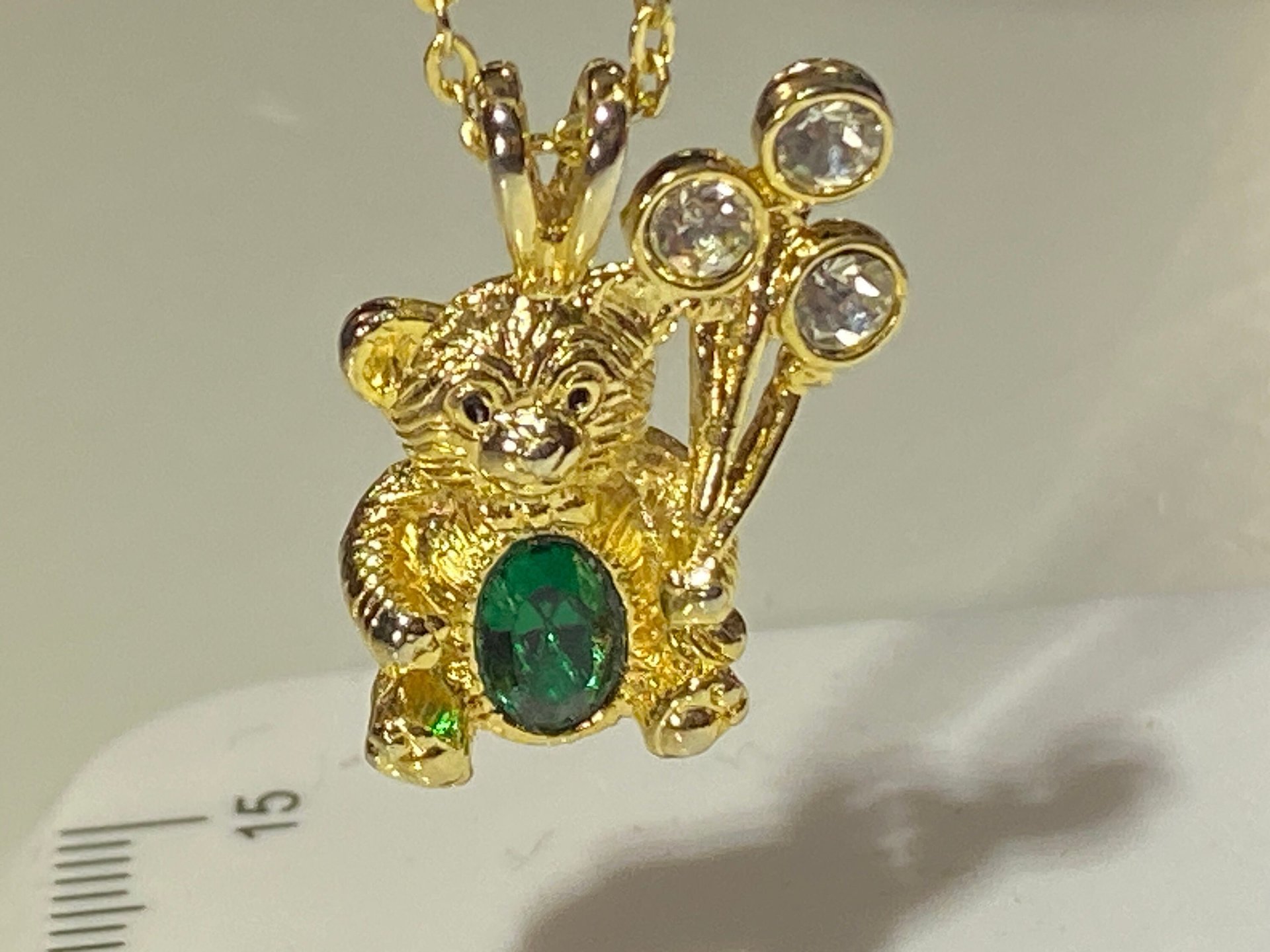 Extremely cute May green birth stone teddy bear holding crystal balloons gold tone pendant with necklace