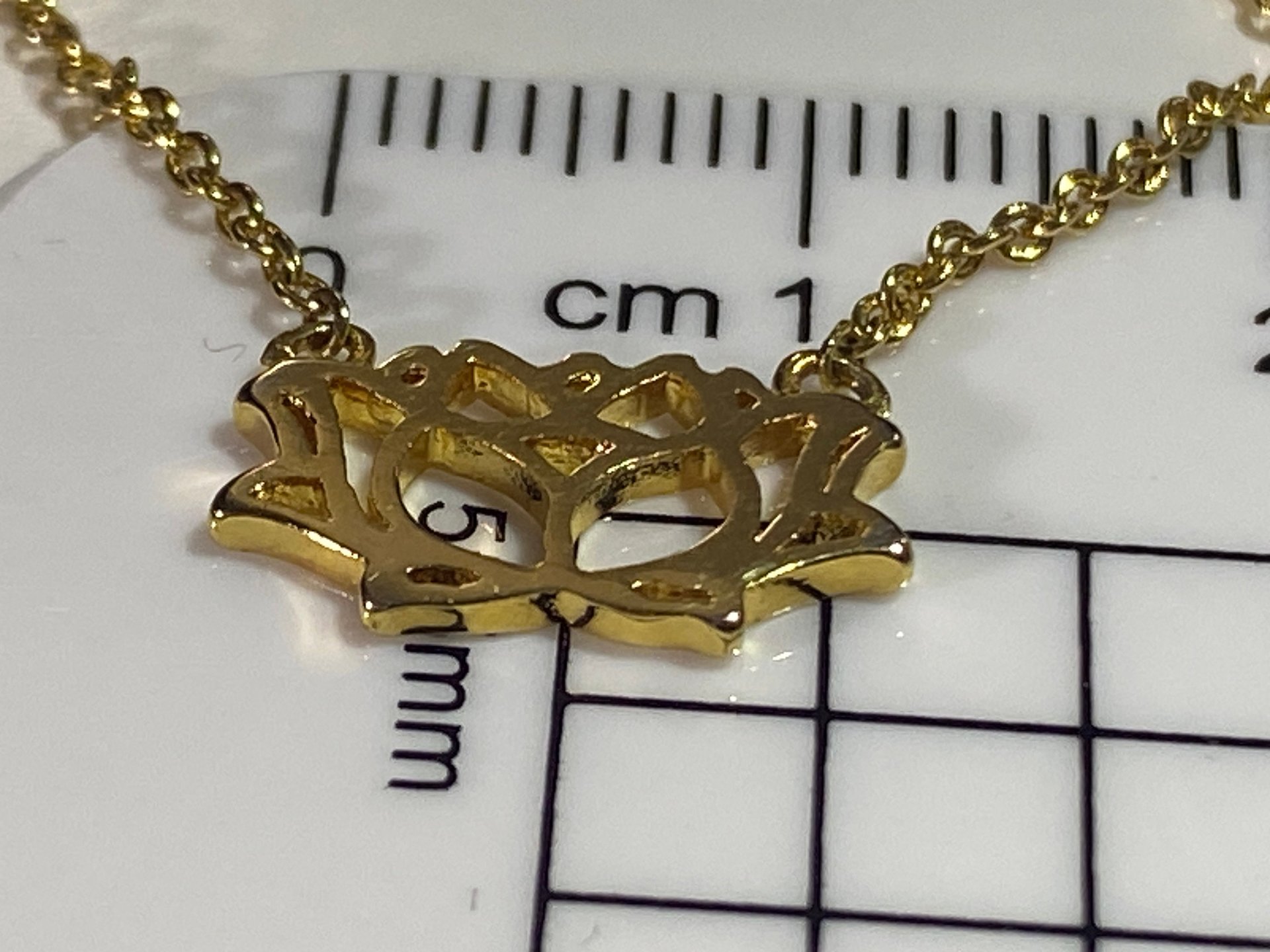 Gold tone Lotus pendant and necklace