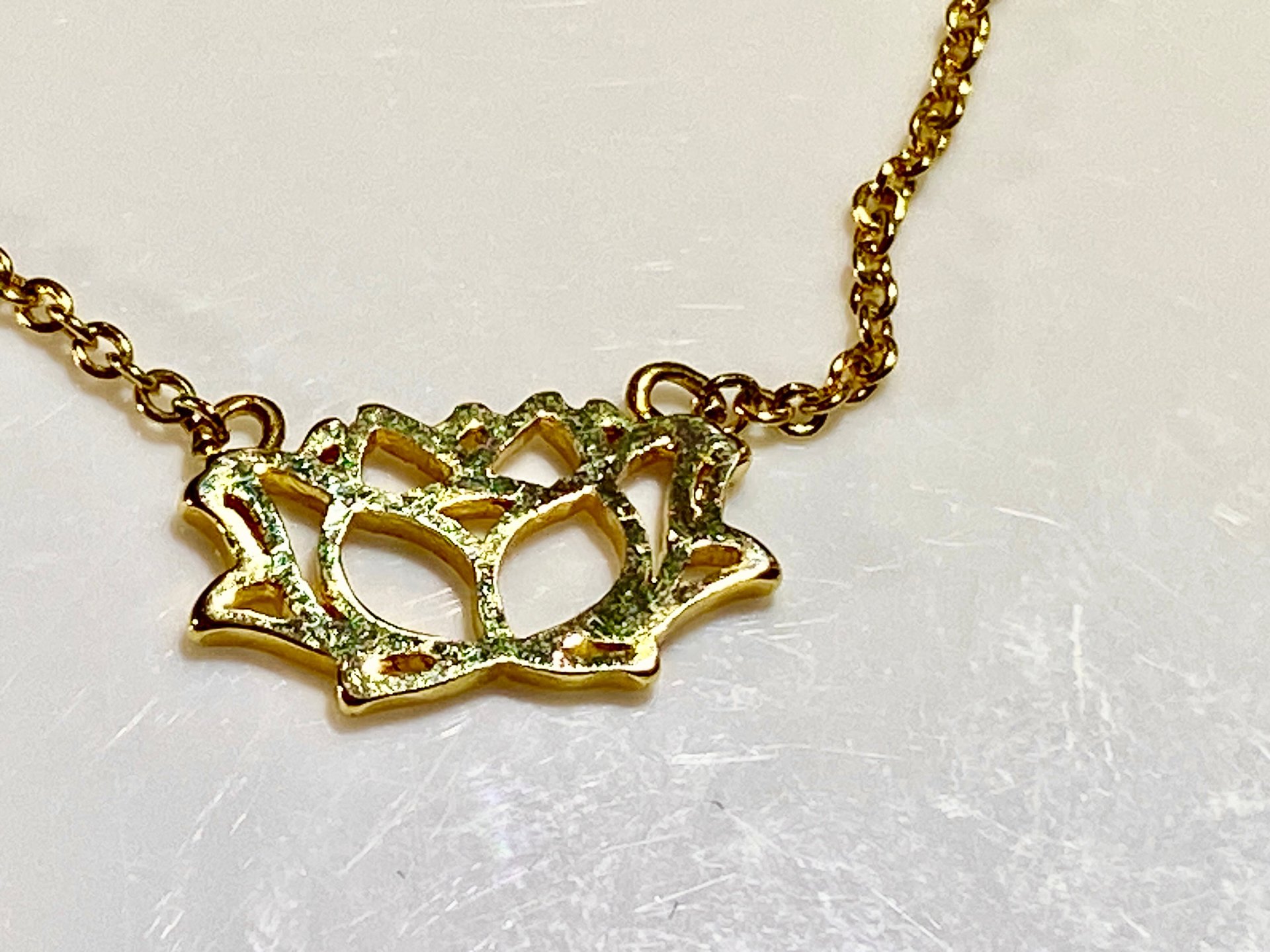 Gold tone Lotus pendant and necklace