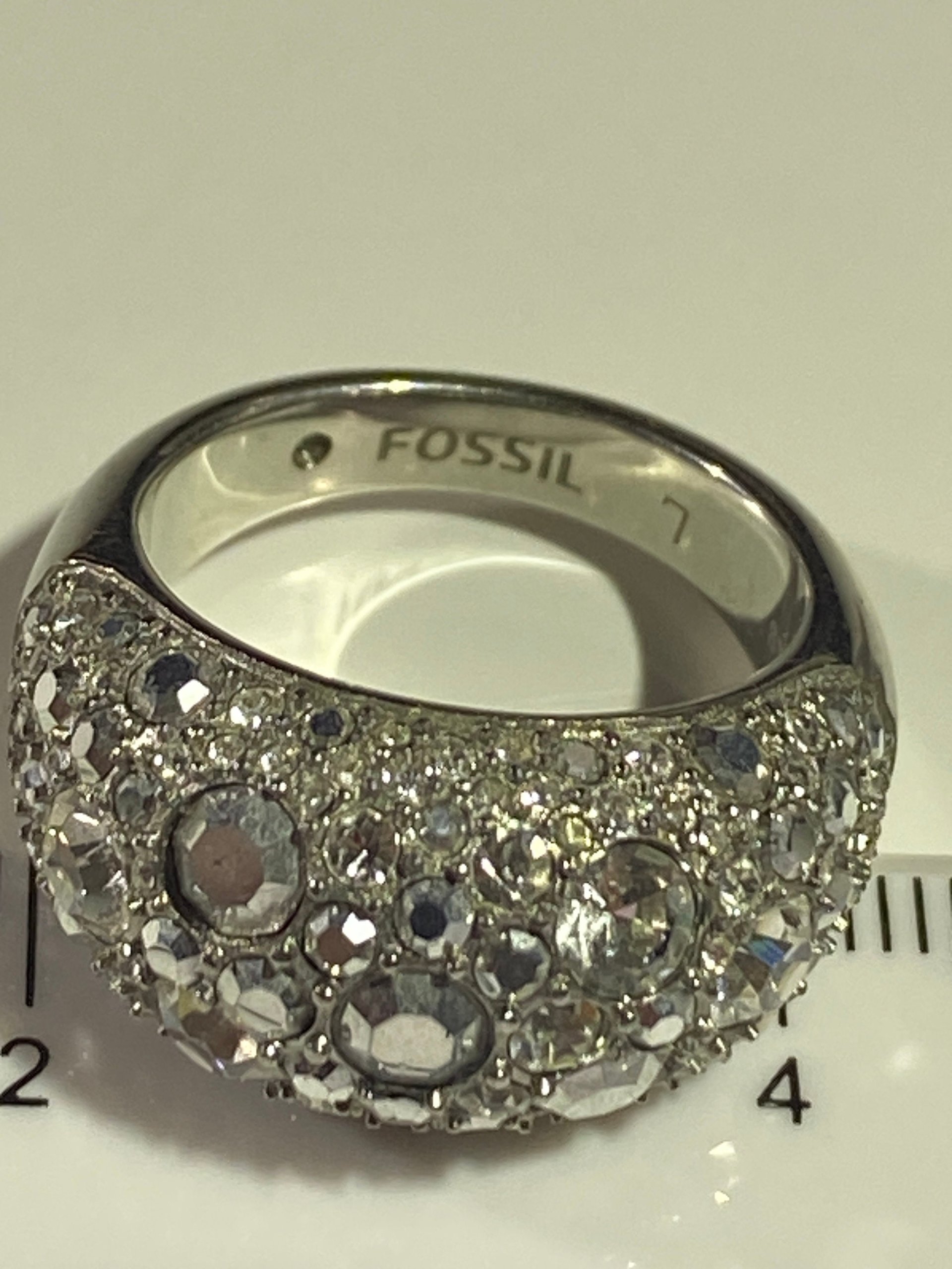 Silver tone Pave sparkly crystals Fossil band statement ring.