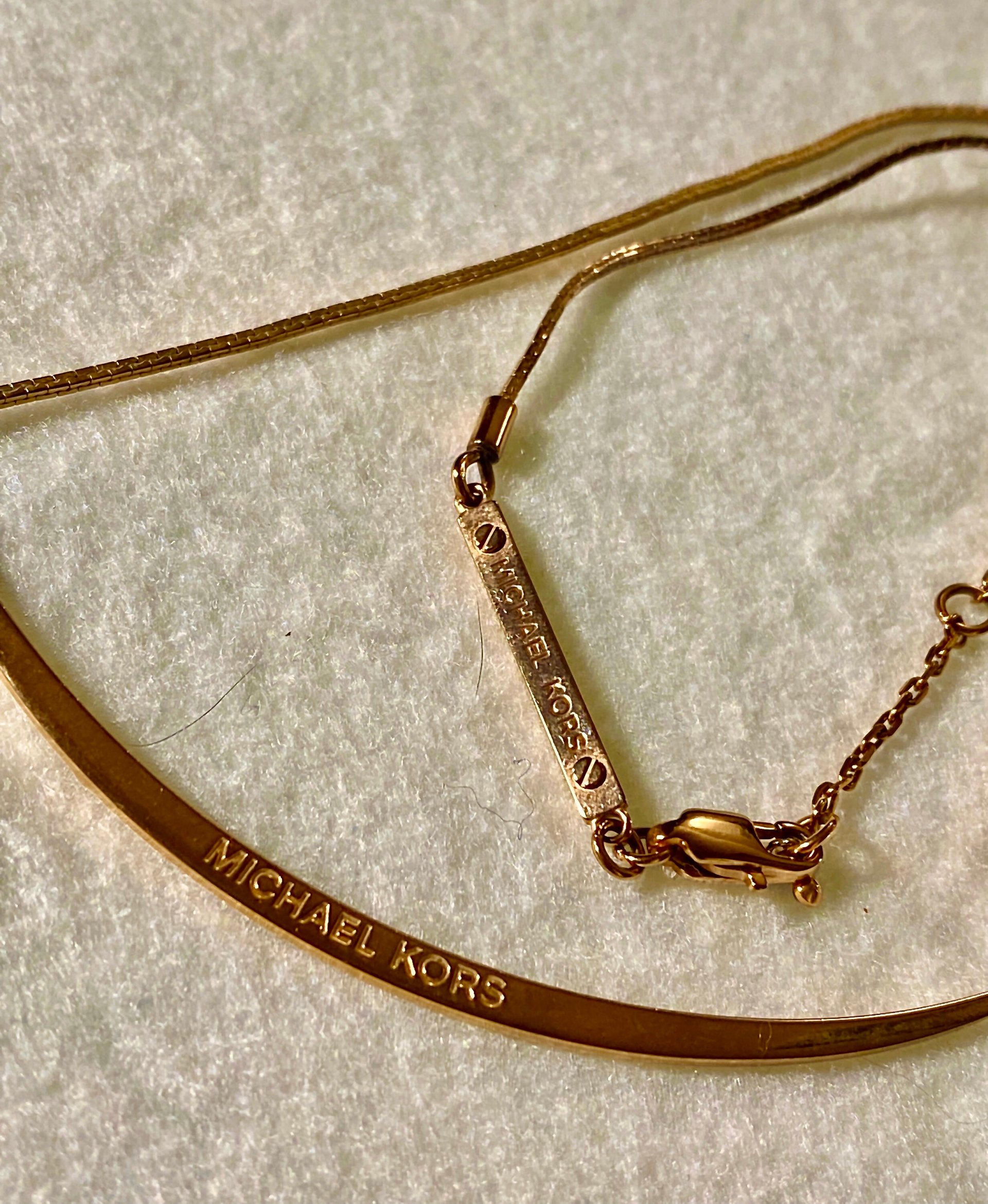 Long Curved Rose Gold Michael Kors Pendant