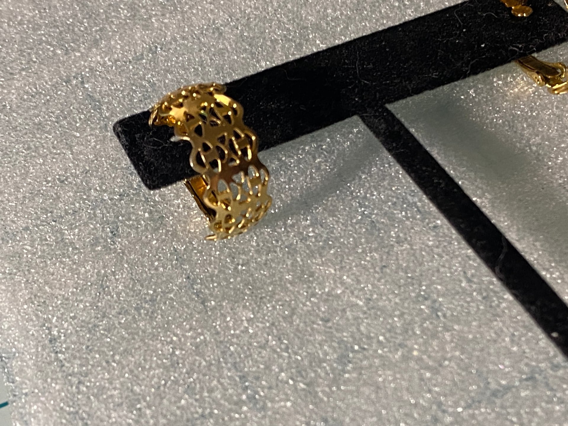 Gold tone thick Art Nouveau love scroll hoop earrings