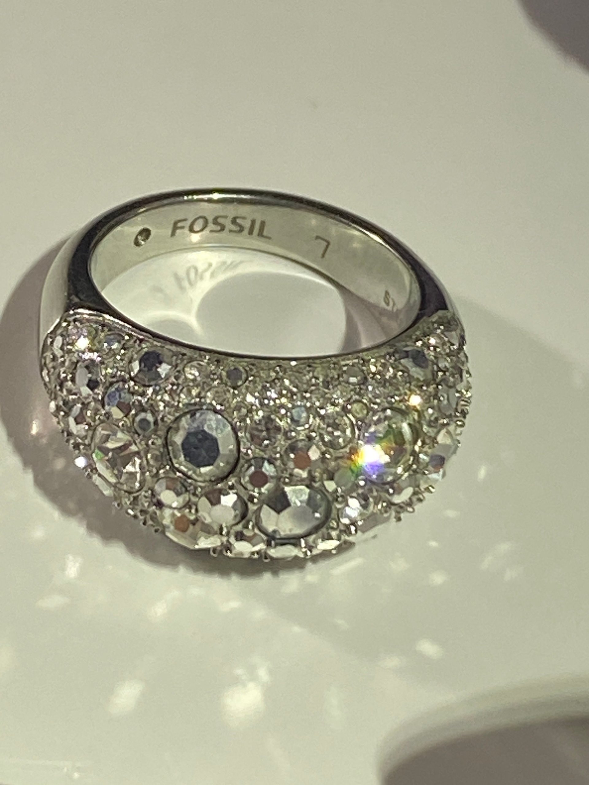 Silver tone Pave sparkly crystals Fossil band statement ring.