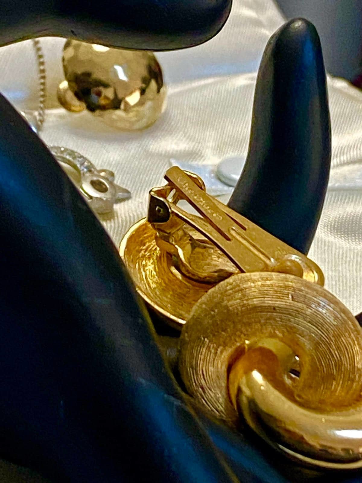 Vintage Gold tone 1980s Christian Dior high polished and textured clip on earrings.
