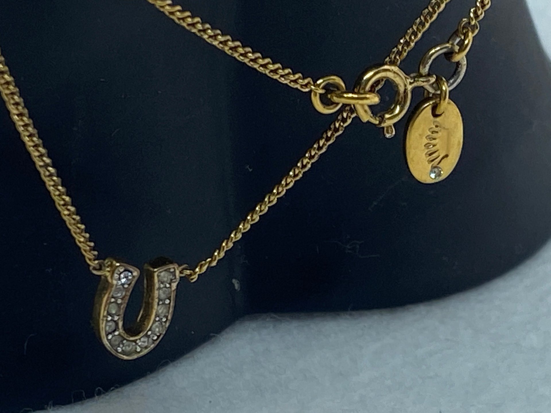 Rare authentic gold tone sparkly horseshoe  signed Juicy Couture