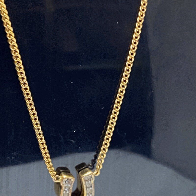 Rare authentic gold tone sparkly horseshoe  signed Juicy Couture