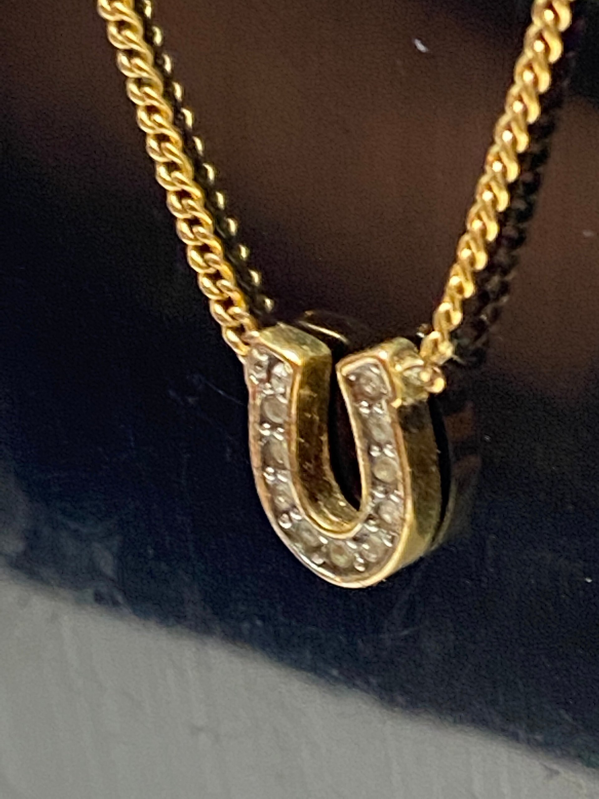 Rare authentic gold tone sparkly horseshoe  signed Juicy Couture