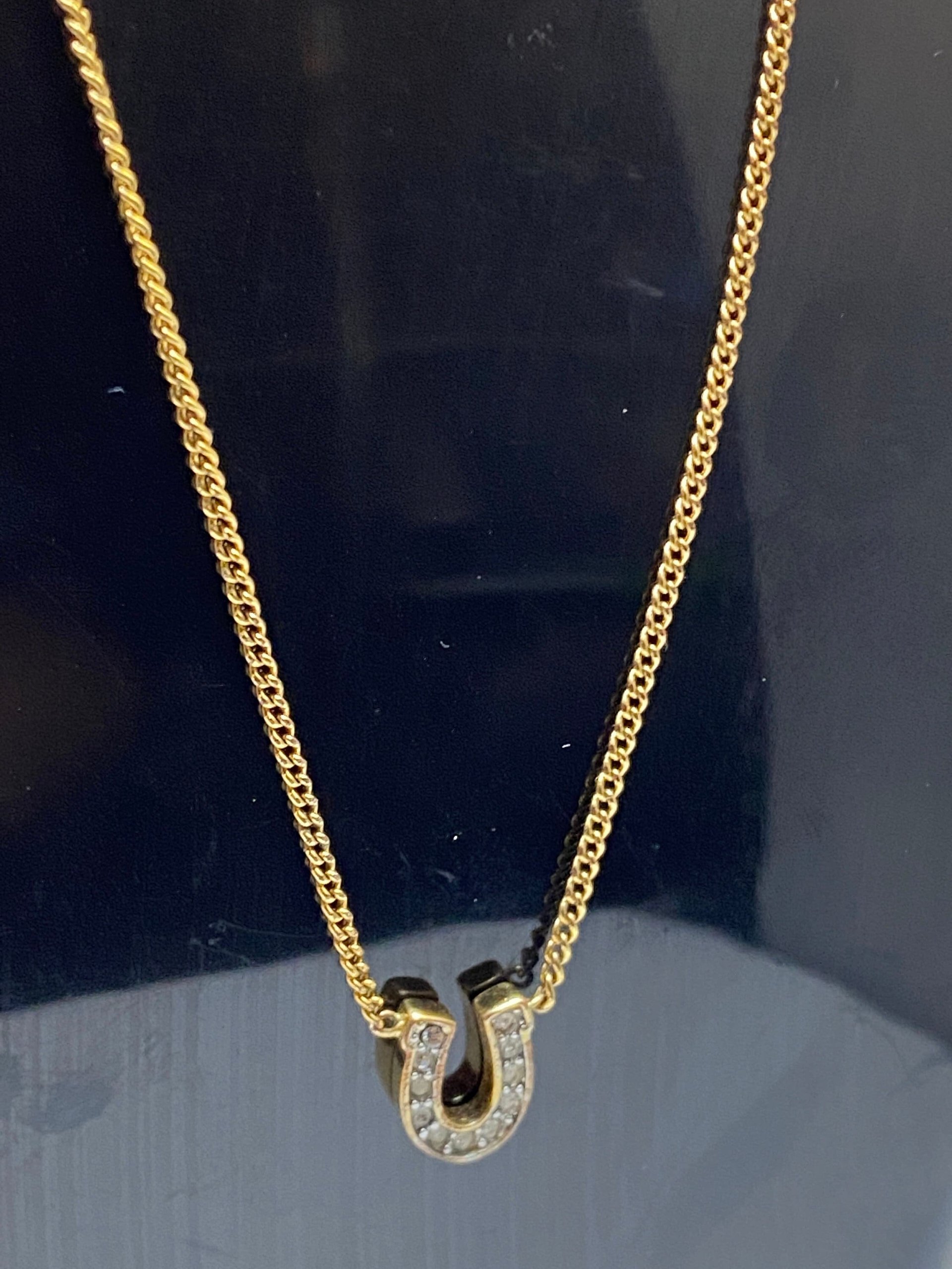 Rare authentic gold tone sparkly horseshoe  signed Juicy Couture