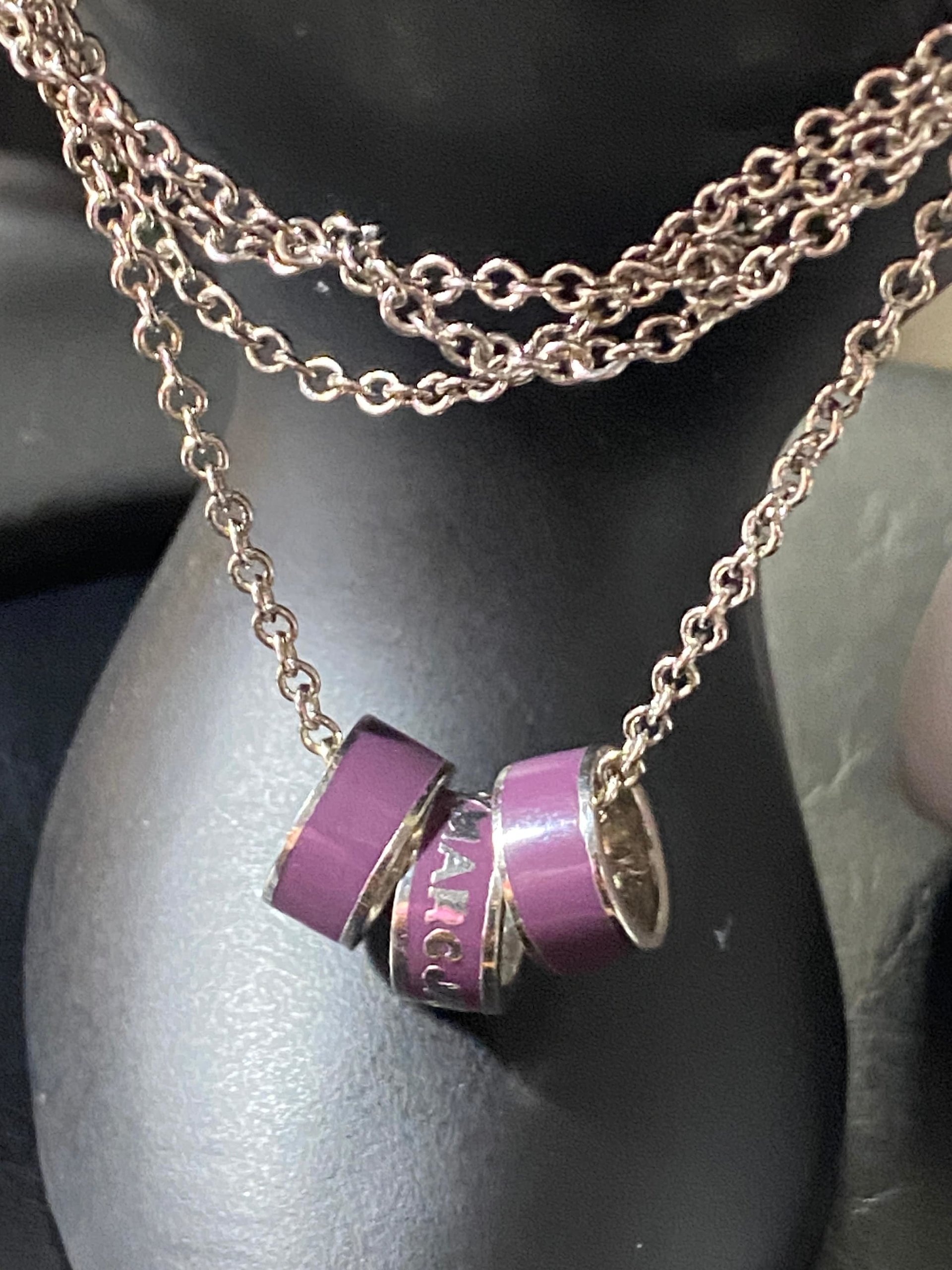 Marc By Marc Jacob - Purple metal ring as pendants on a long silver tone chain necklace