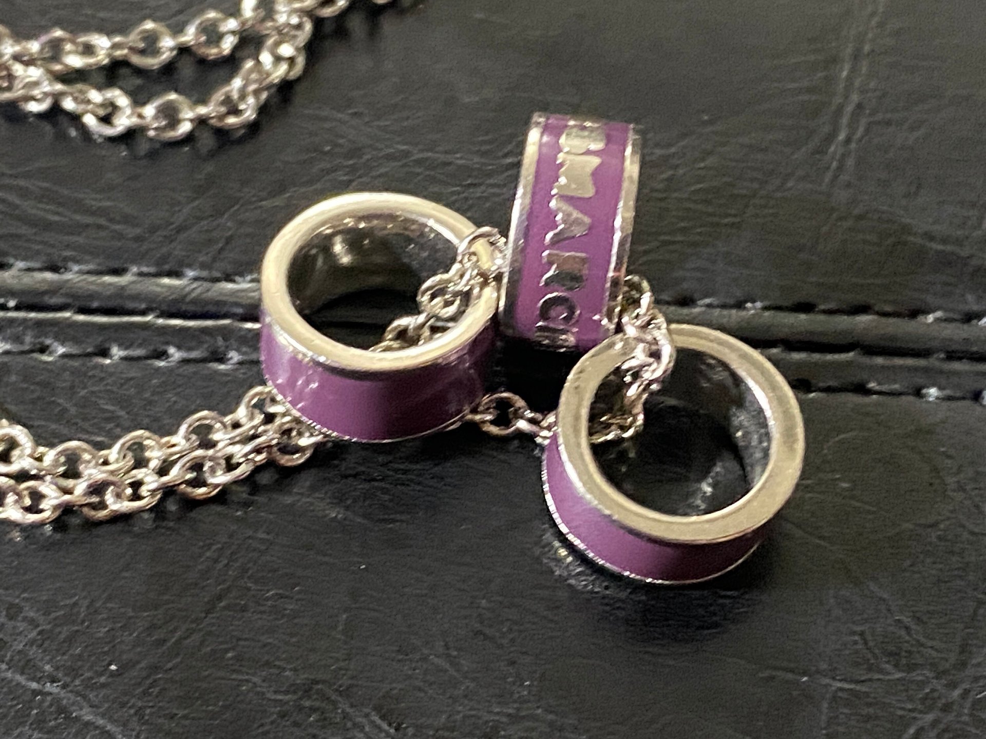 Marc By Marc Jacob - Purple metal ring as pendants on a long silver tone chain necklace