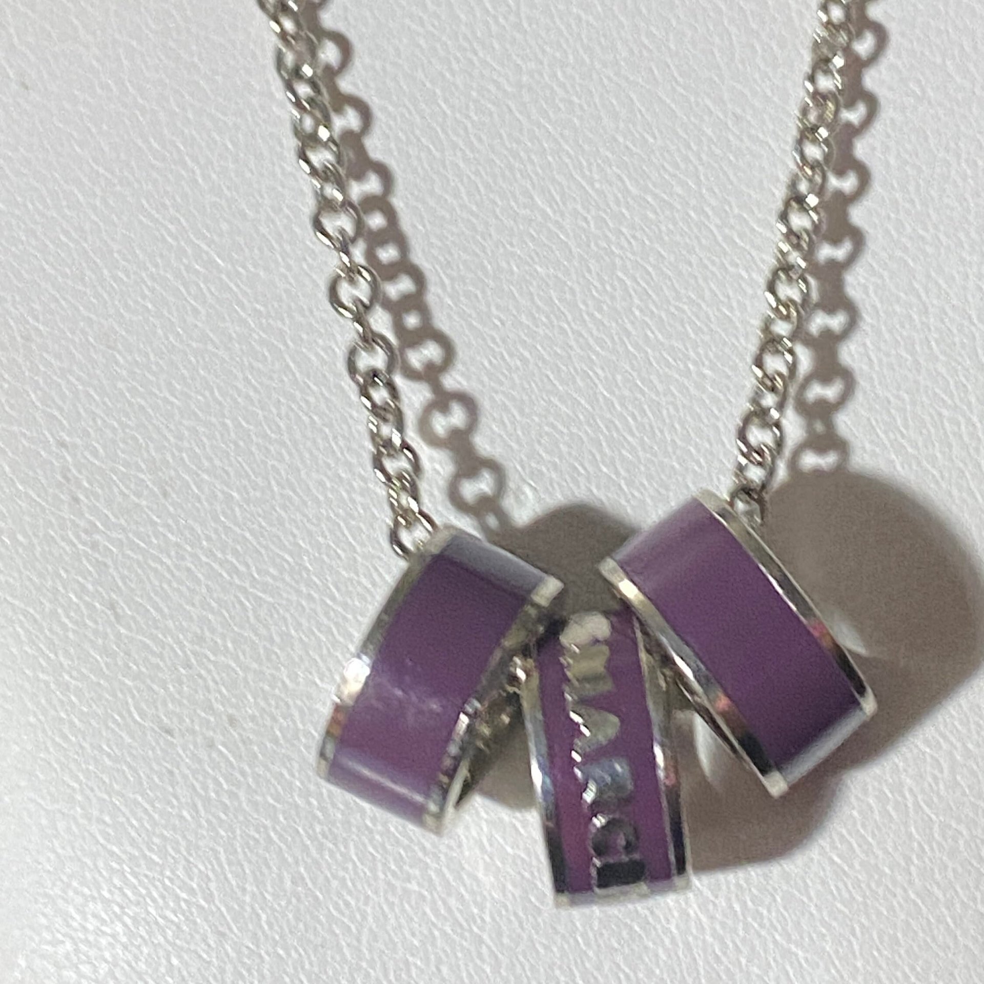 Marc By Marc Jacob - Purple metal ring as pendants on a long silver tone chain necklace