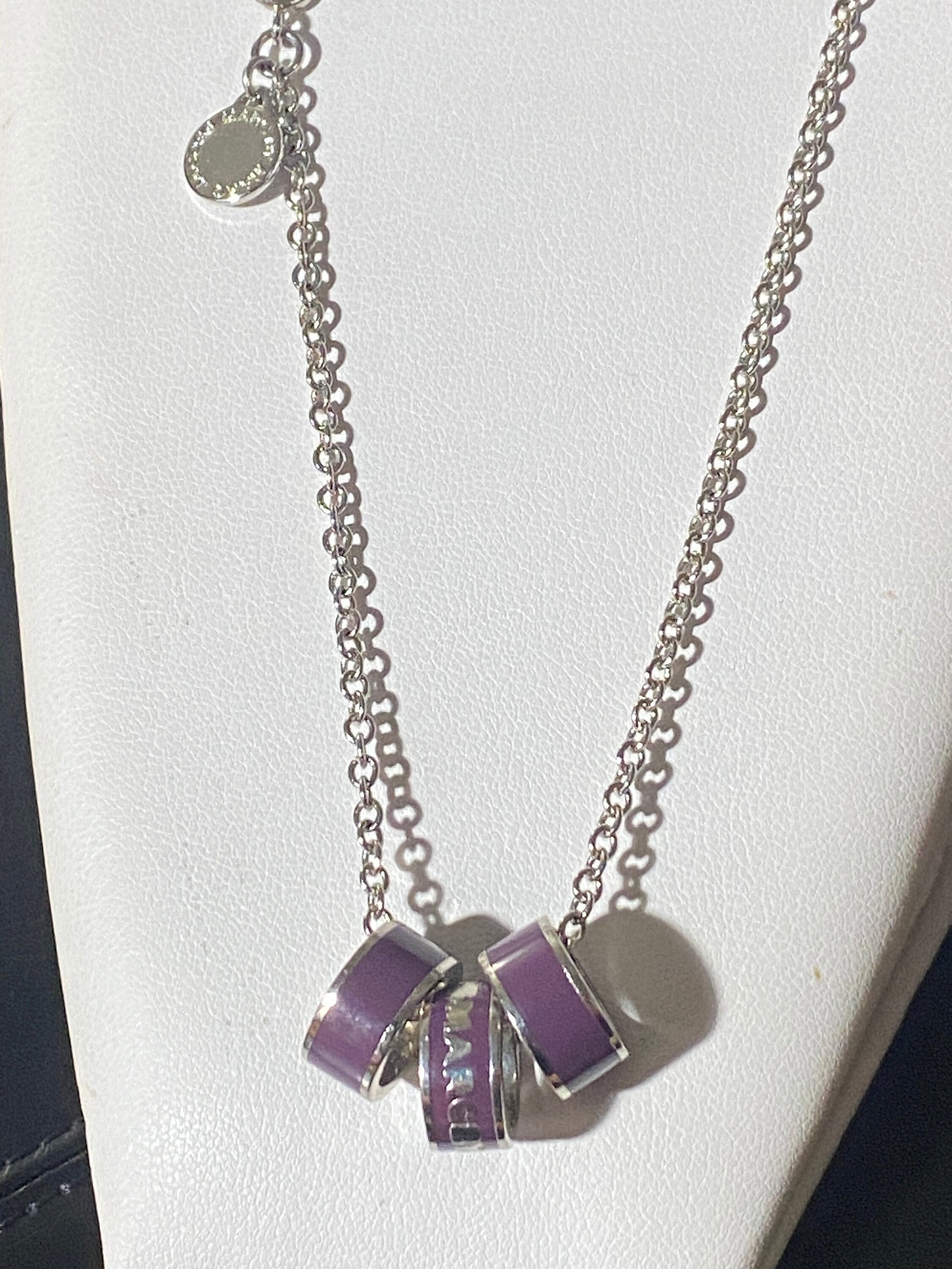 Marc By Marc Jacob - Purple metal ring as pendants on a long silver tone chain necklace