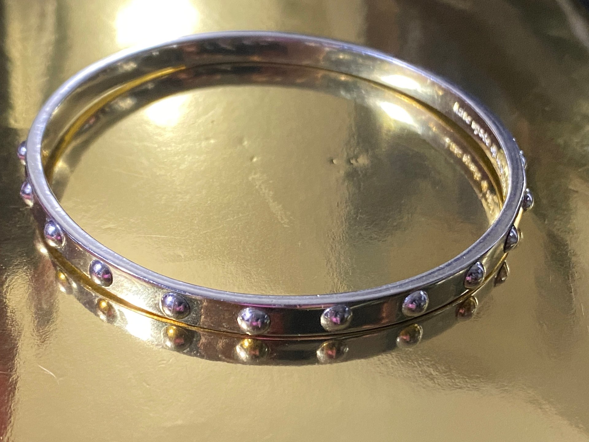 Kate Spade Silver tone studded bangle