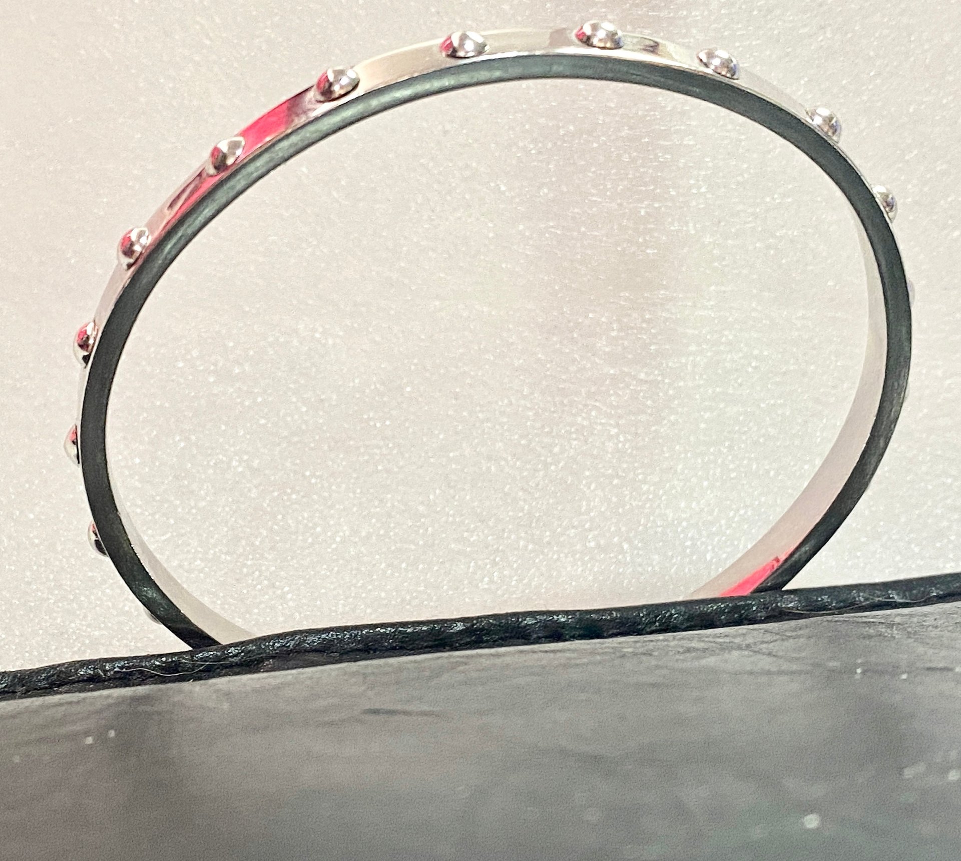 Kate Spade Silver tone studded bangle