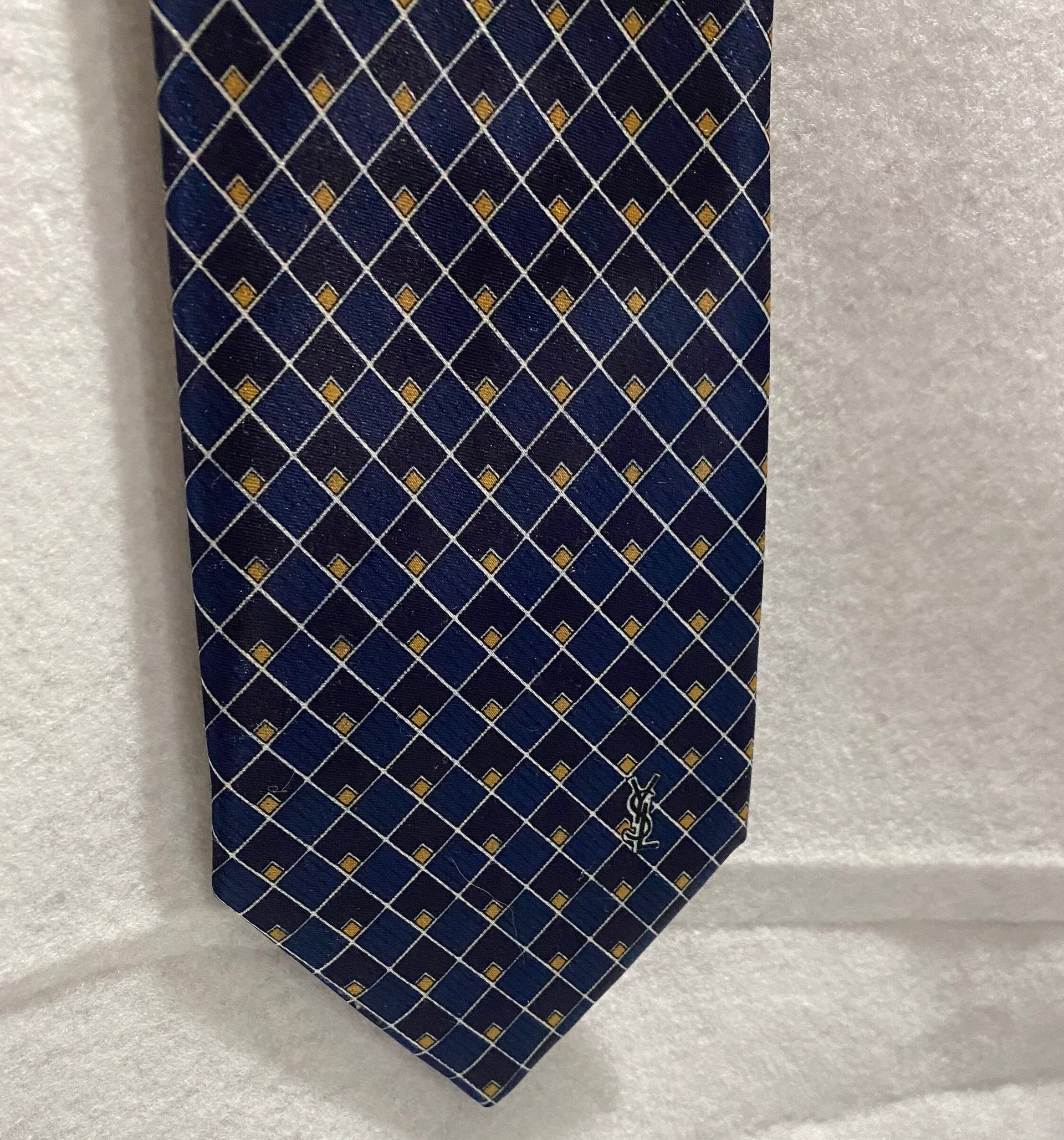 Blue  Ives St.Laurent neck tie with white and blak small geometric squares