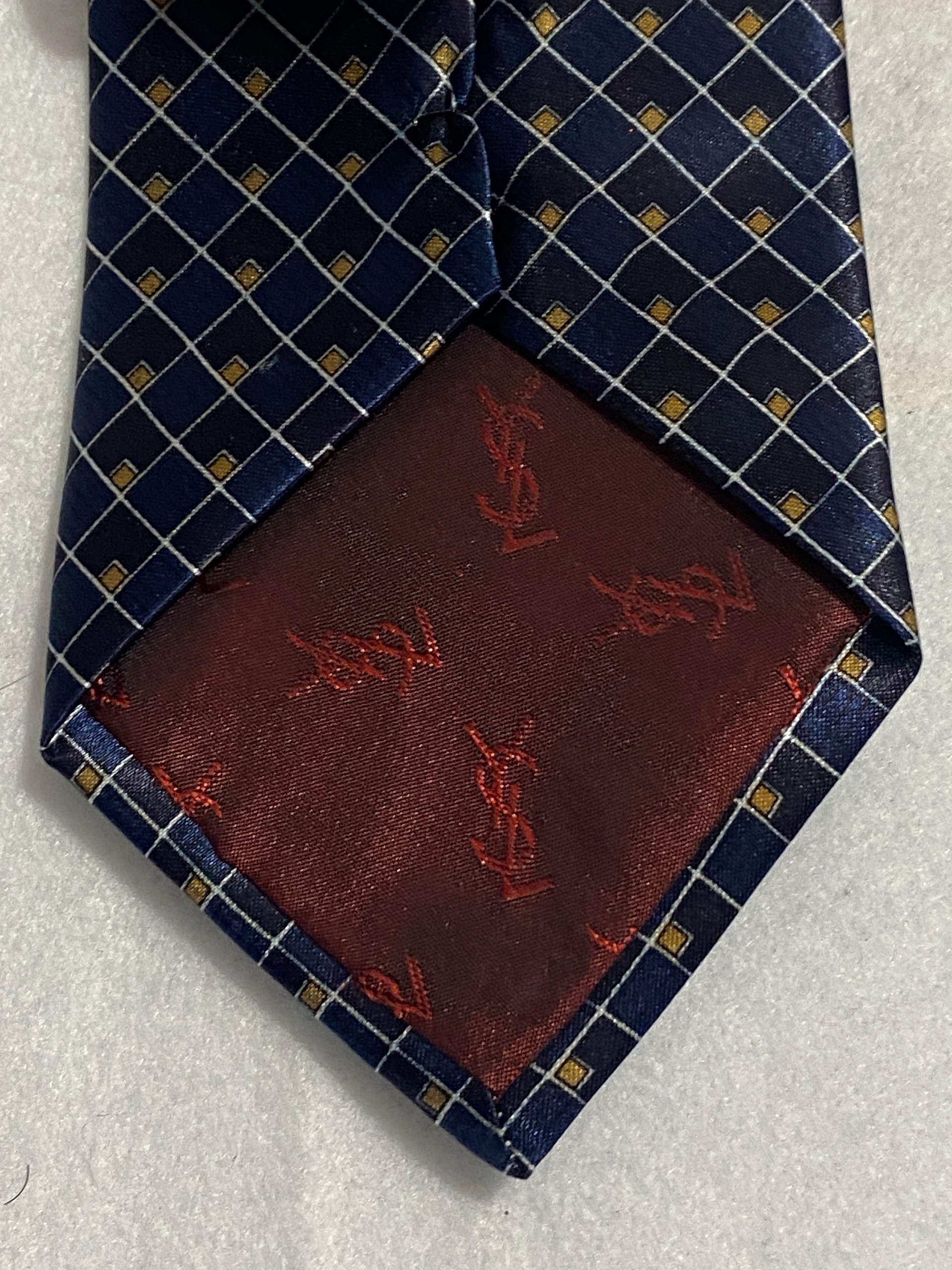 Blue  Ives St.Laurent neck tie with white and blak small geometric squares