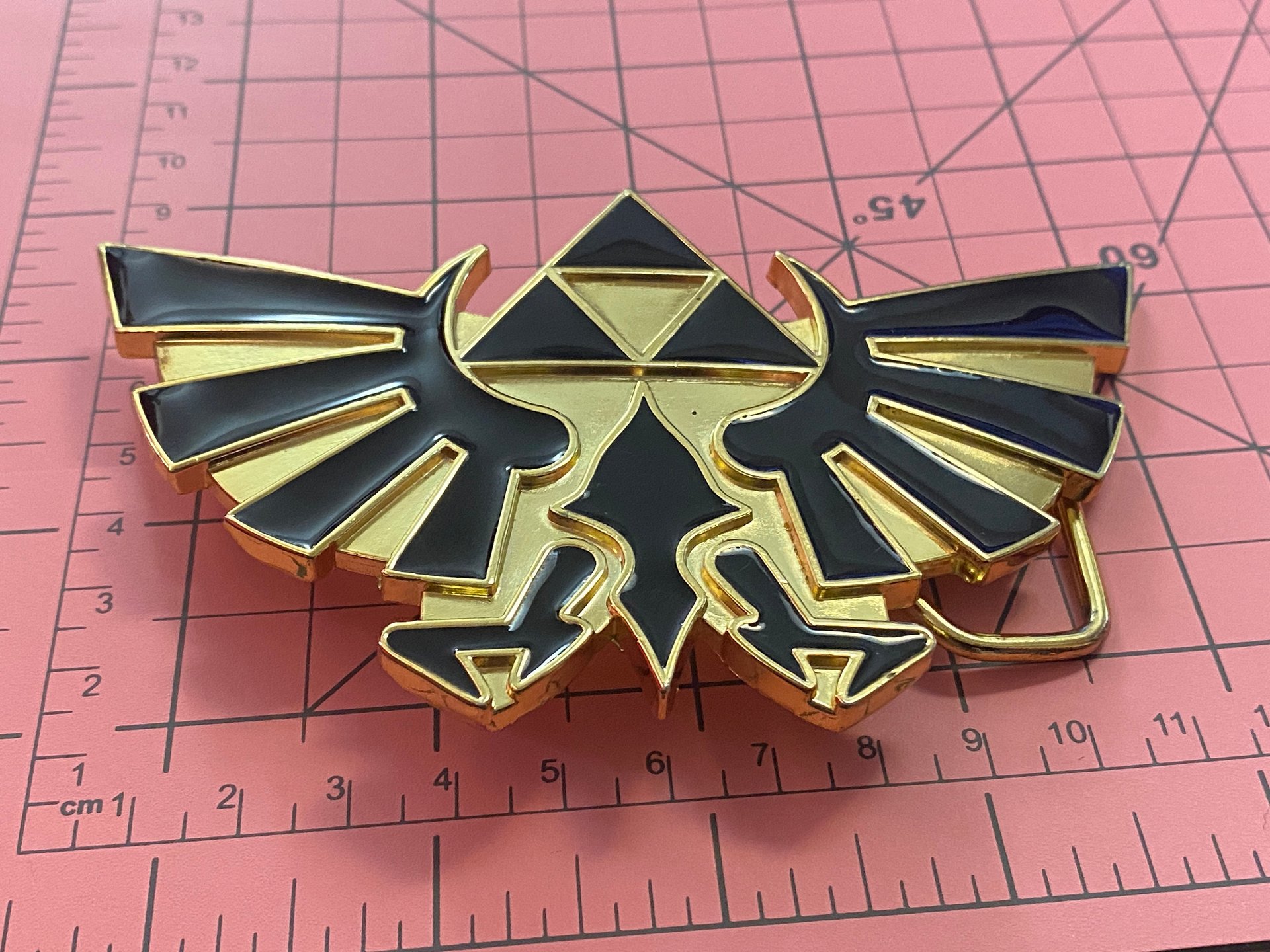 Vintage 2010 Nintendo TM Large Legend of Zelda Gold and black enameled Belt Buckle
