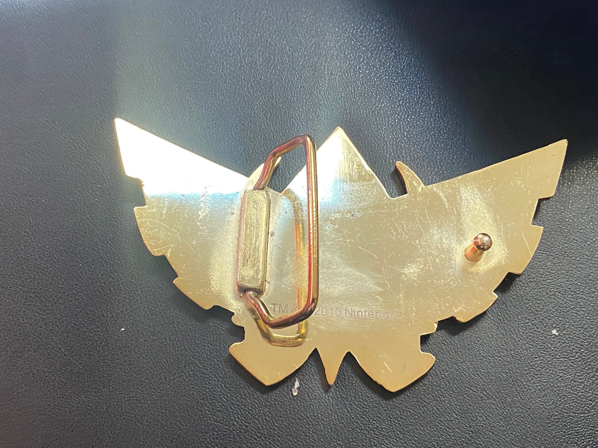 Vintage 2010 Nintendo TM Large Legend of Zelda Gold and black enameled Belt Buckle
