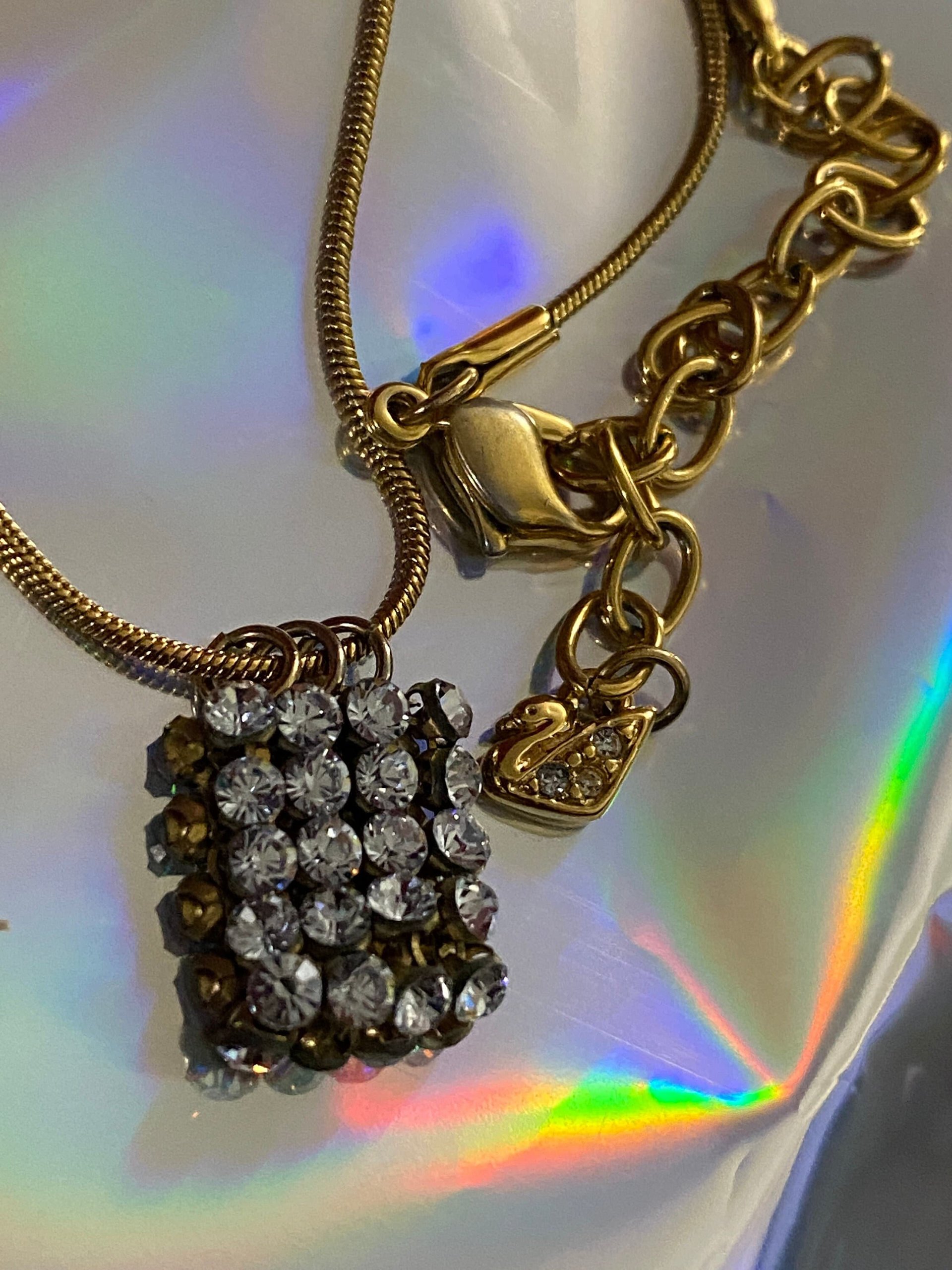 Swarovski crystals pendants signed on a gold tone Authentic