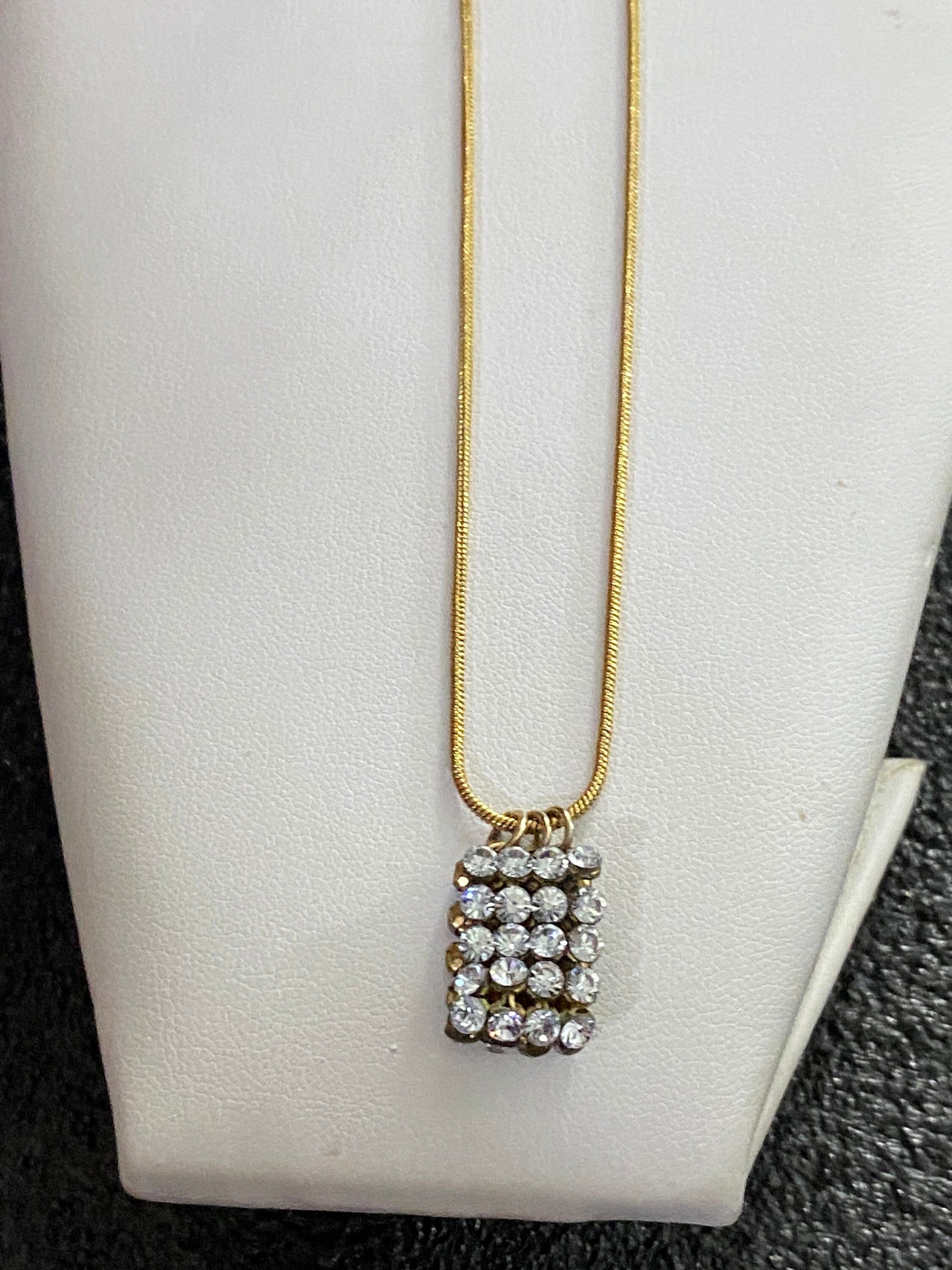Swarovski crystals pendants signed on a gold tone Authentic