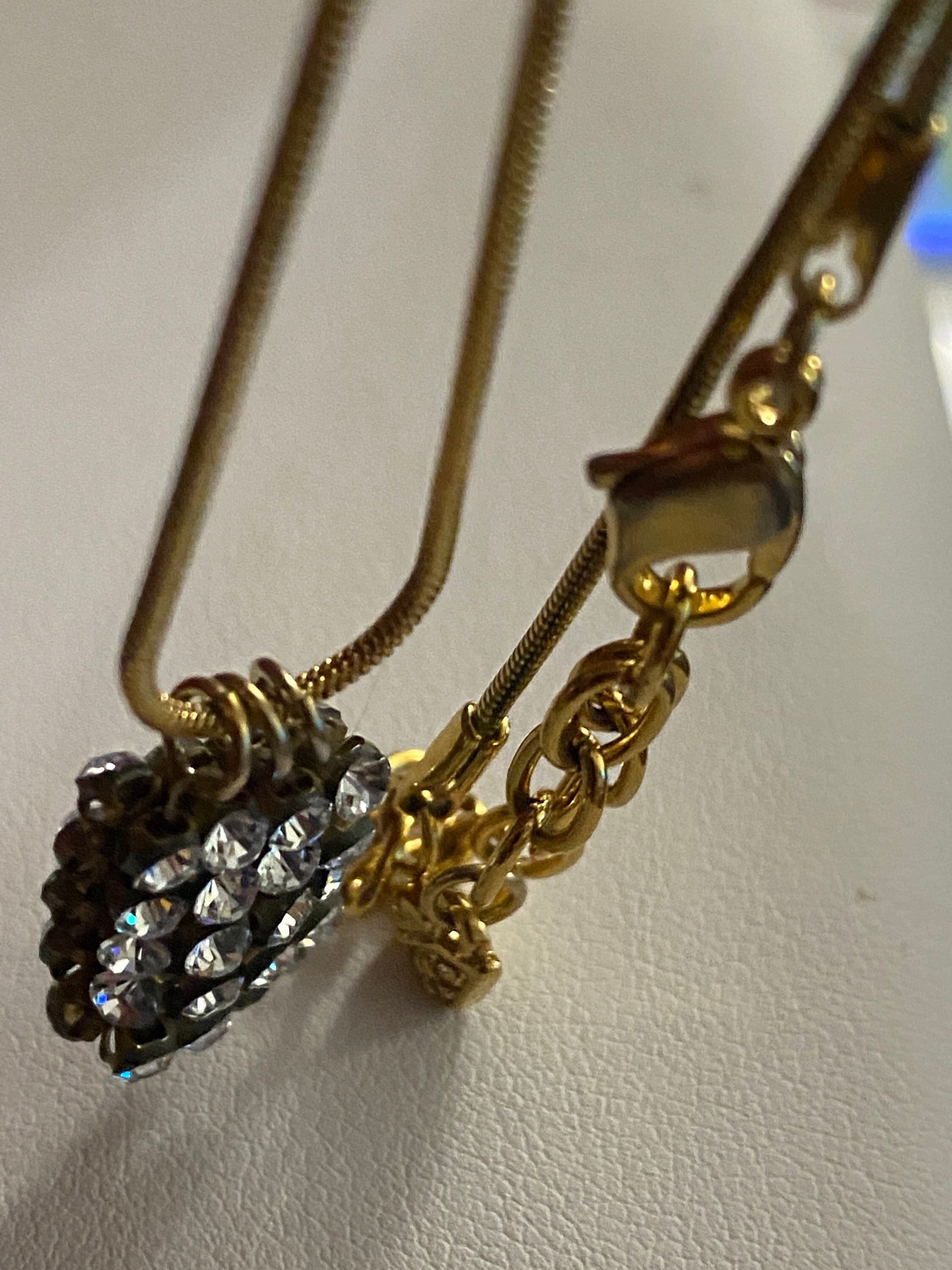 Swarovski crystals pendants signed on a gold tone Authentic