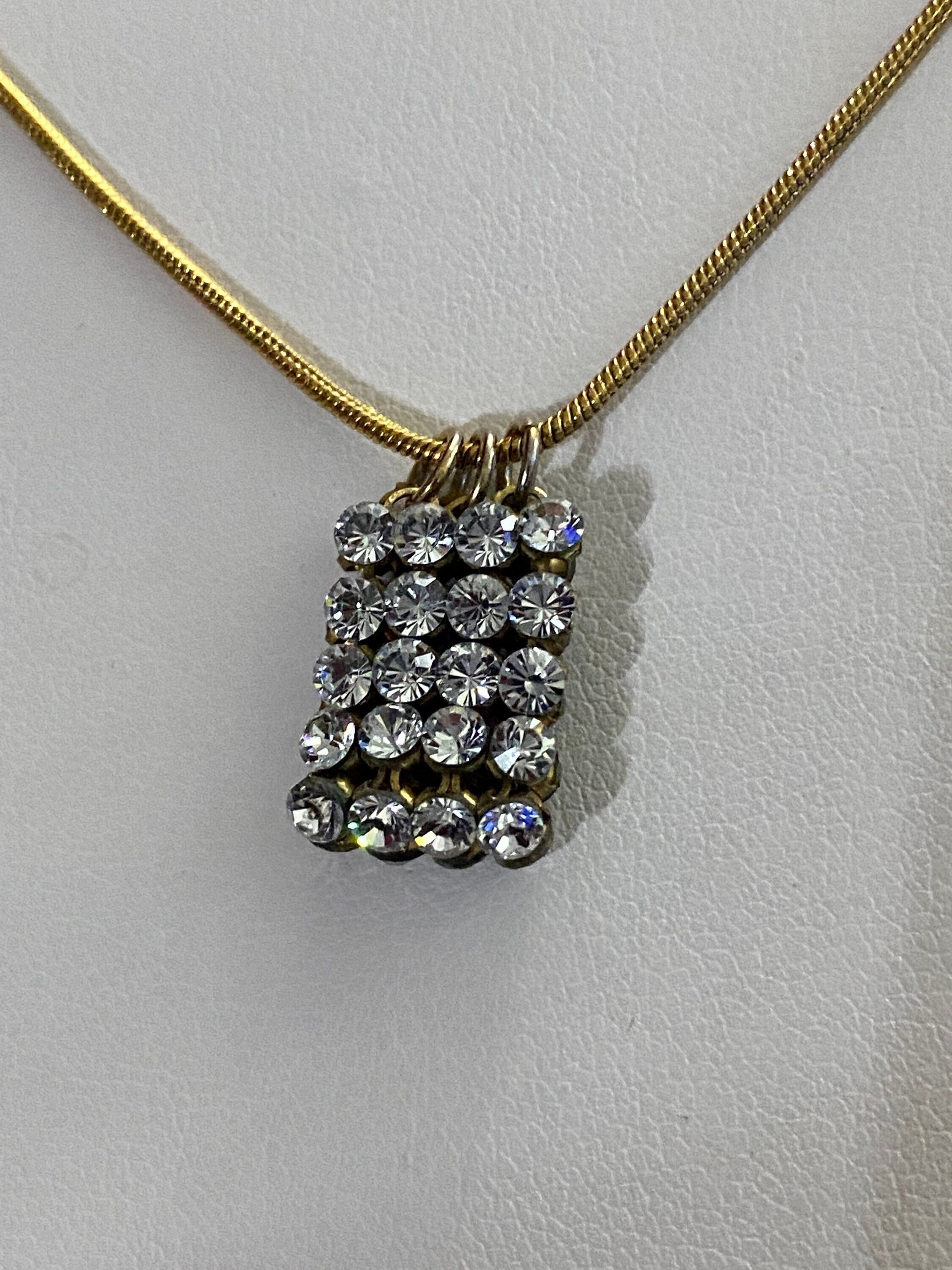 Swarovski crystals pendants signed on a gold tone Authentic