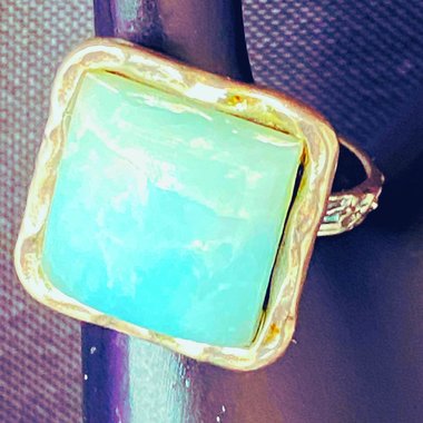 925 stamped square seal colour stone with filigree accents around the band