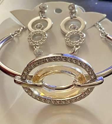 Authentic Swarovski Signed Logan Golden Shadow Bangle Bracelet and Rhodium-plated Circles Masquerade Pendant Pierced Earrings set.