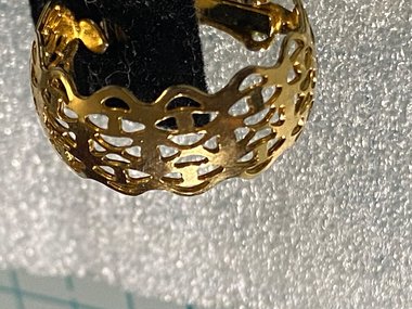 Gold tone thick Art Nouveau love scroll hoop earrings
