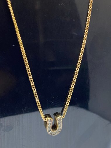 Rare authentic gold tone sparkly horseshoe  signed Juicy Couture