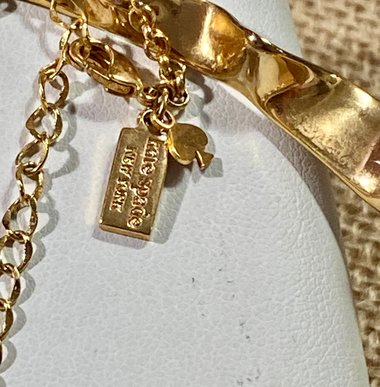Kate Spade Gold tone  “Frilled to Pieces” crew necklace
