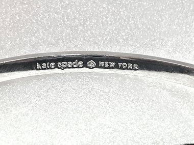 Kate Spade Silver tone studded bangle