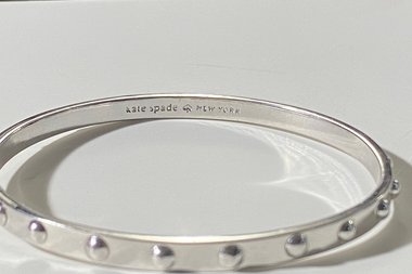Kate Spade Silver tone studded bangle