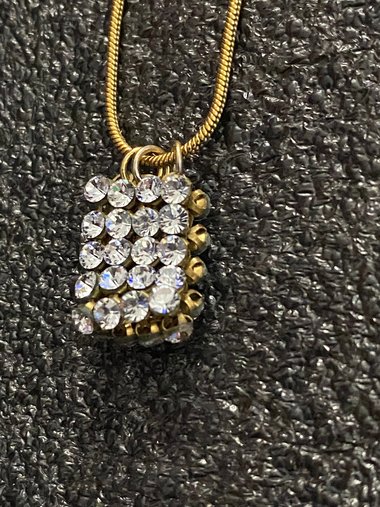 Swarovski crystals pendants signed on a gold tone Authentic